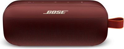 Close-up view of the Bose SoundLink Flex Bluetooth Speaker showing the textured speaker grille and control buttons on the top