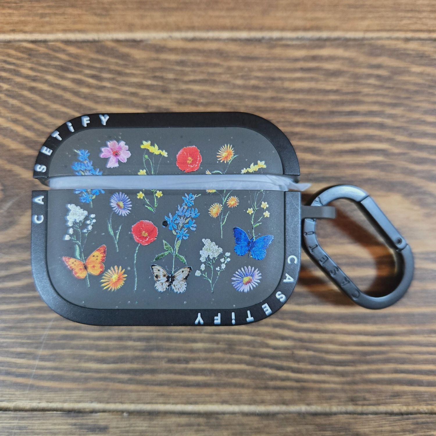 Front view of the CASETiFY Ultra Impact Bounce Case for Apple AirPods Pro, showing the sturdy protective exterior