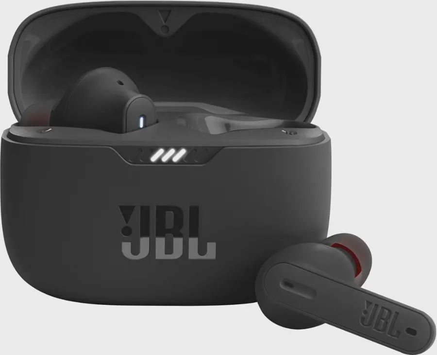 Open charging case displaying JBL Tune 235NC earbuds seated inside.