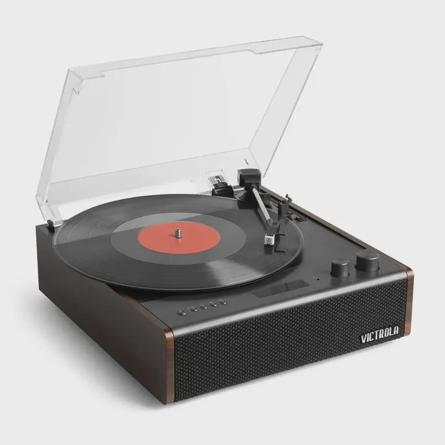 Victrola Eastwood Signature Hybrid Record Player with a vinyl record on the platter.