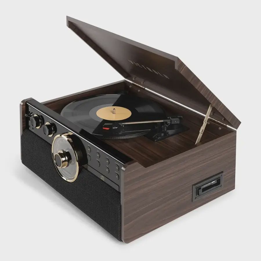 Victrola Empire 6-in-1 Record Player with dust cover open and a vinyl record on the platter, tonearm in play position.