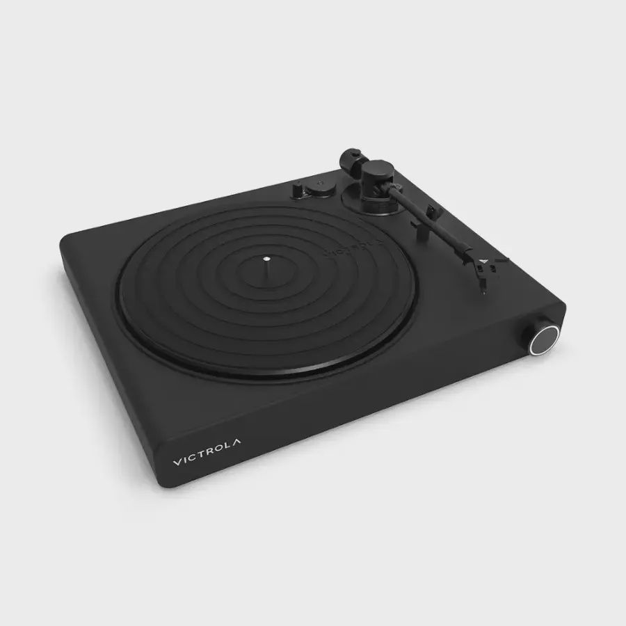 Victrola Stream Onyx record player with modern design and featuring built-in speakers.