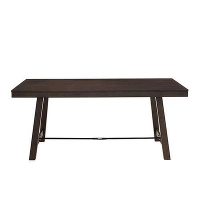 Front view of the Walker Edison Farmhouse Trestle Dining Table highlighting the sturdy trestle legs.