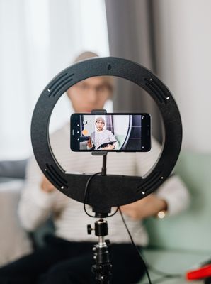 Vlogging accessories including tripods, selfie sticks, and lighting kits at Budget Buys Dunedin, Florida.