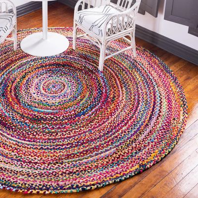 Round Jute and Recycled Cotton rugs handmade in India these rugs are sustainable, hard wearing, jute rugs, colourful various sizes,fairtrade