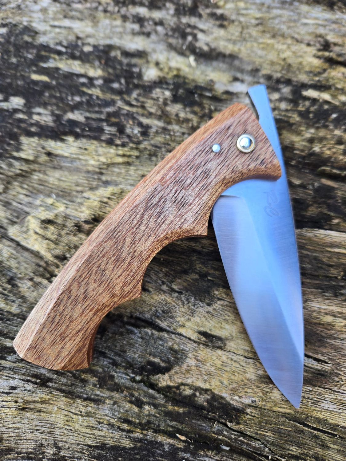 Couteau friction deux clous