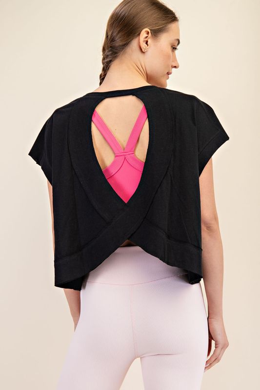 ​An oversized cotton slub short sleeve top with a cropped length and eye-catching open back details