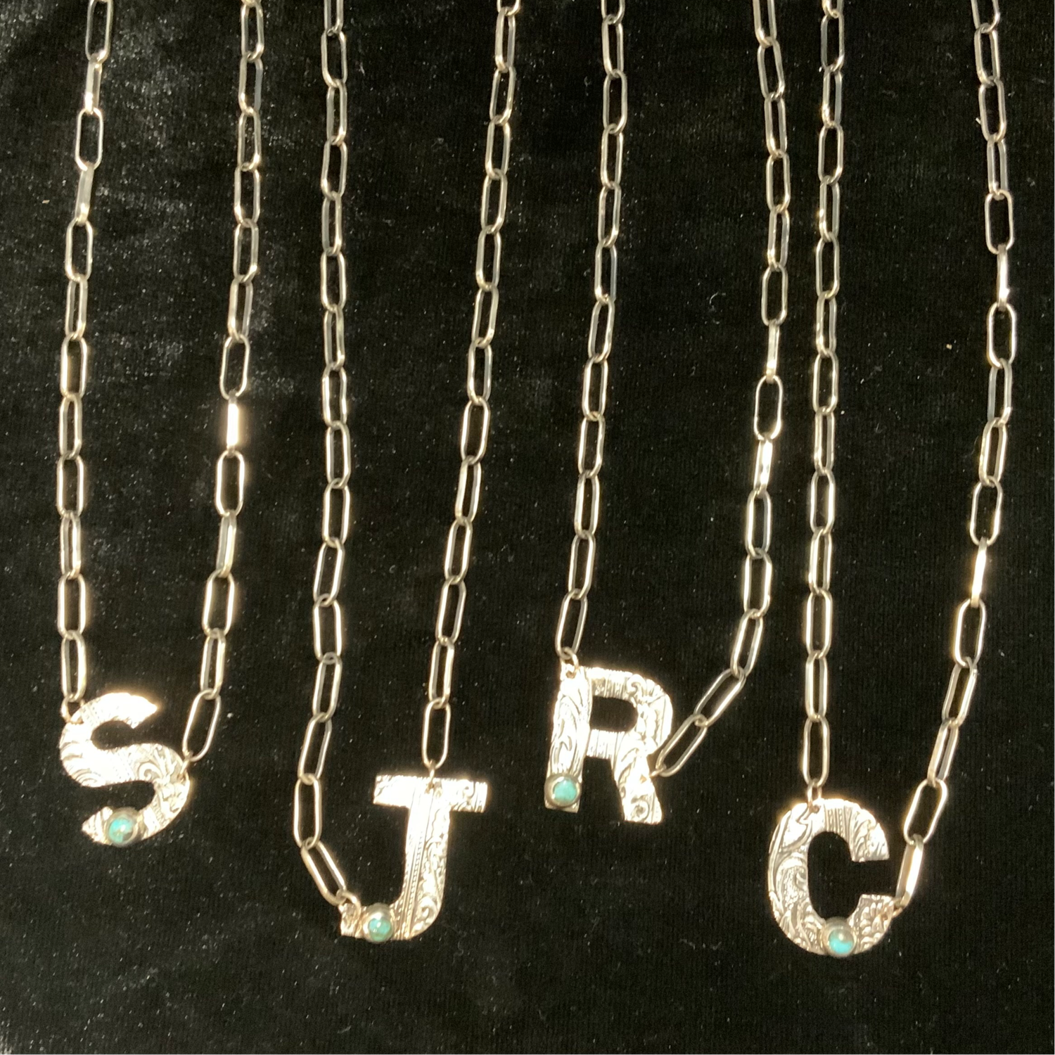 SMALL STAMPED LETTER W/TURQ T380XS