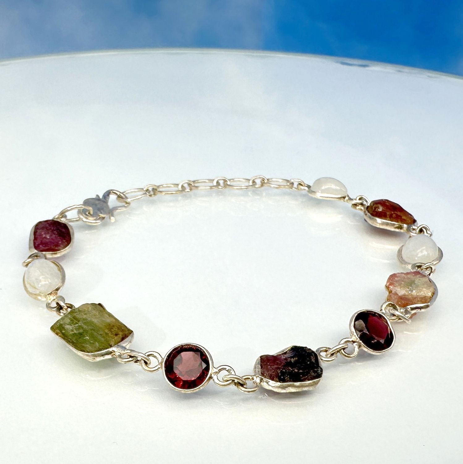 bracelet with genuine faceted garnet and genuine raw tourmaline in 925 sterling silver