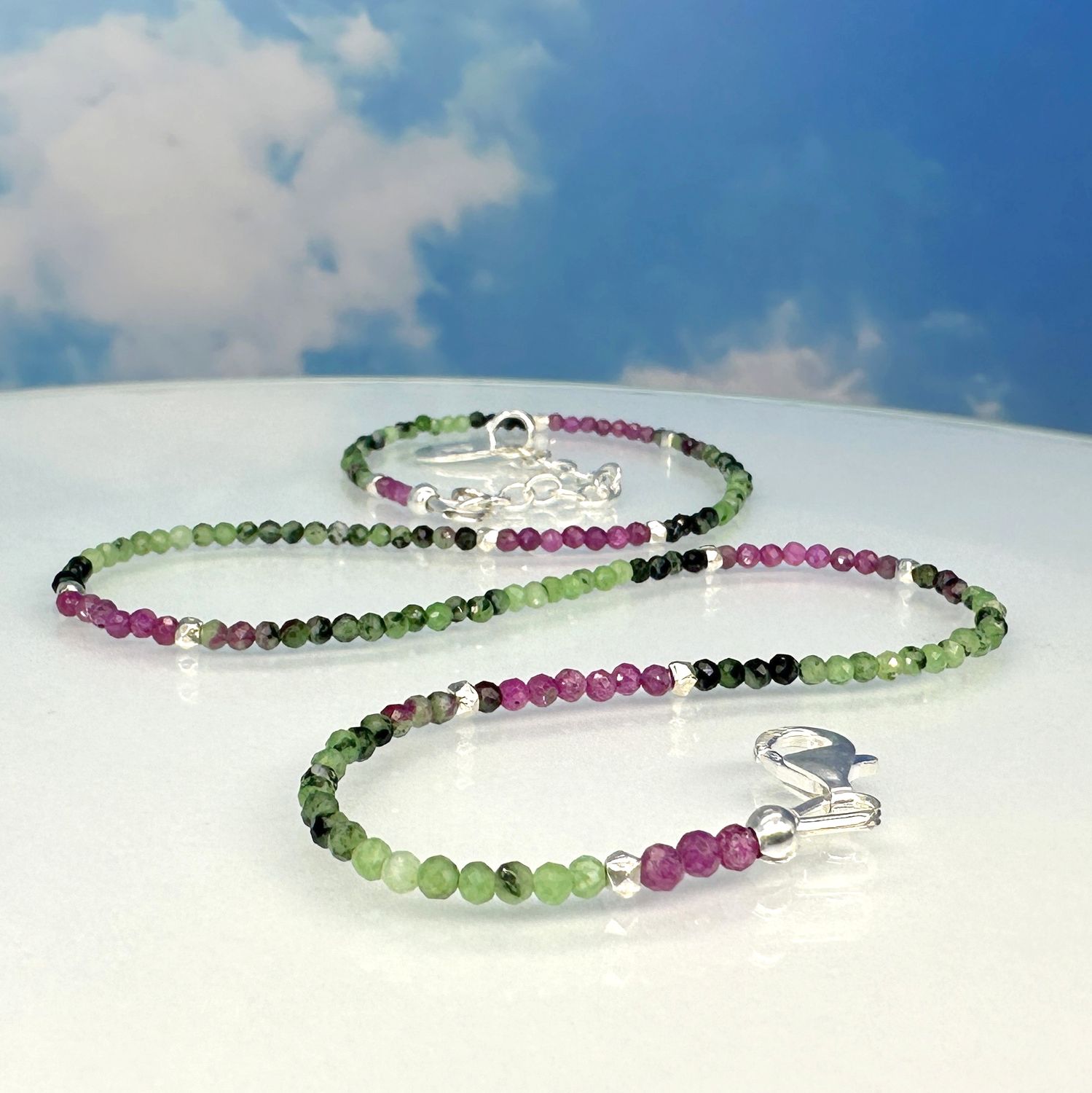 Necklace made from faceted ruby zoisite with elements made from 925 Sterling silver