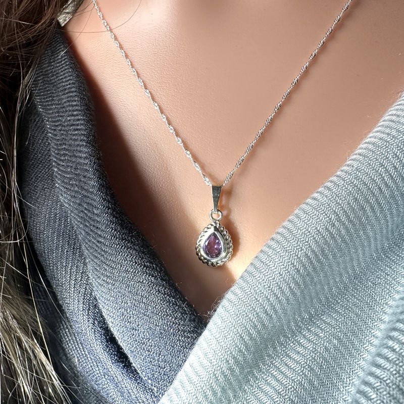 
Twisted, delicate necklace with a pendant made of real faceted amethyst, set in 925 sterling silver. 
