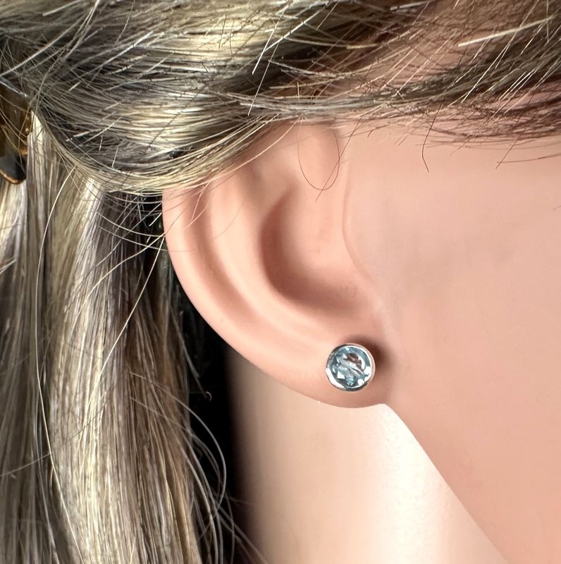 Beautiful, real, faceted topaz earrings/studs made of 925 sterling silver.
