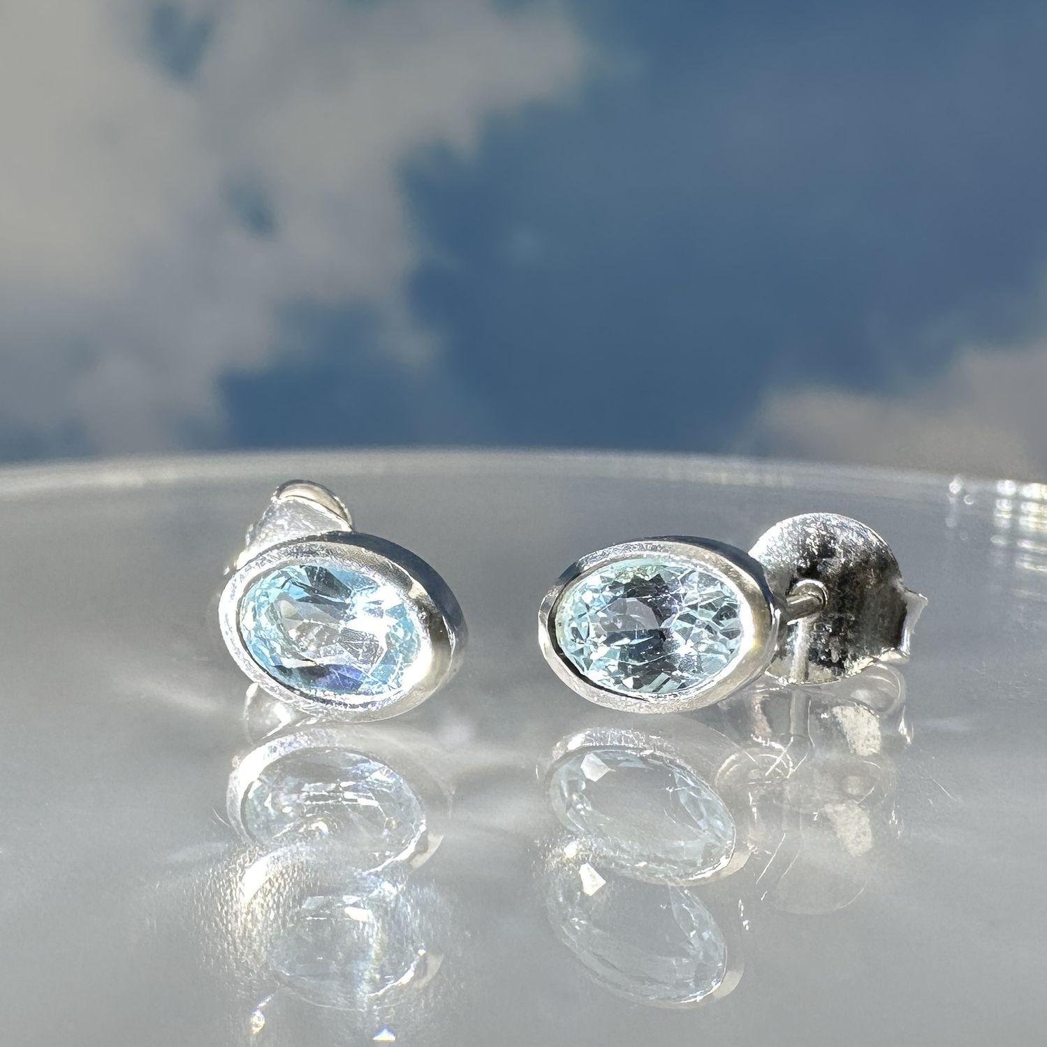 Beautiful earrings/studs made of blue topaz, set in 925 sterling silver. 