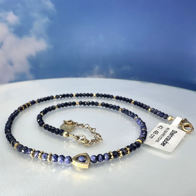 
Beautiful, elegant necklace made of natural, genuine, faceted sapphires with elements made of 925 silver, hard gold-plated