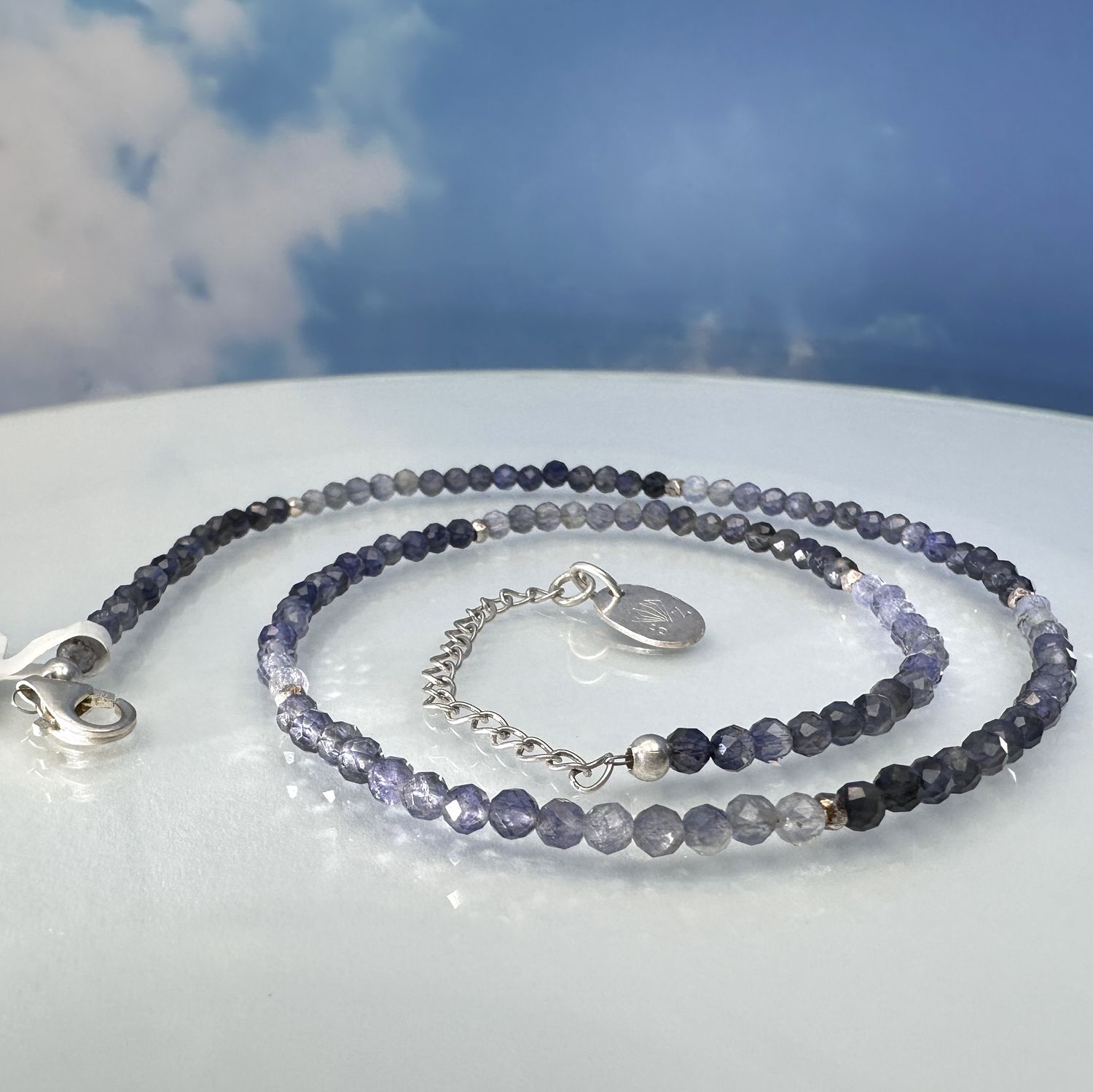 
Beautiful, elegant necklace made of faceted genuine Iloith/water sapphire with elements made of 925 sterling silver. 