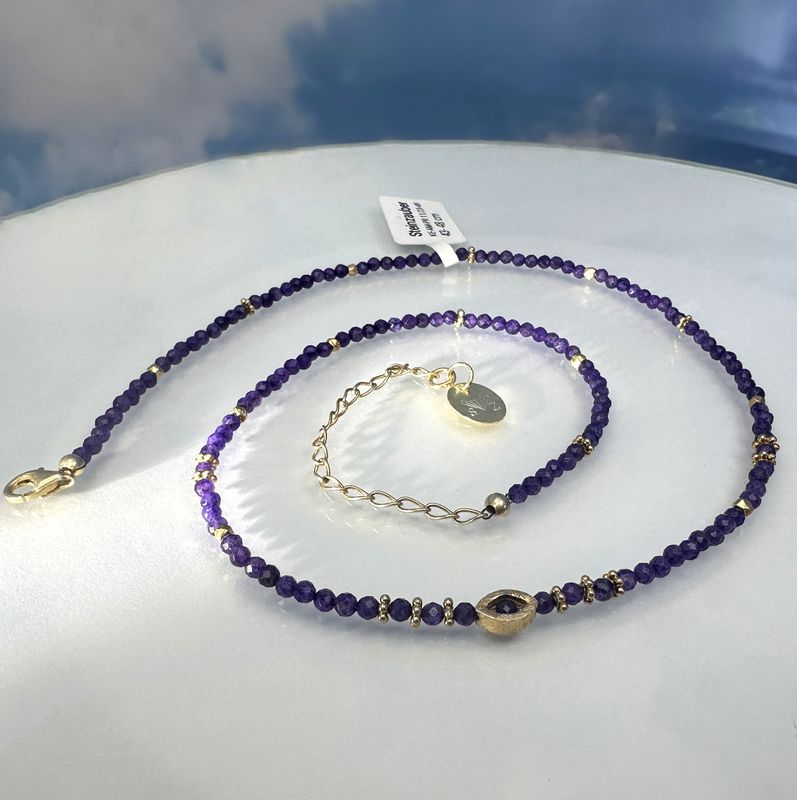 
Gemstone necklace "purpel shine" made of faceted dark amethyst with elements made of hard gold-plated 925 sterling silver.