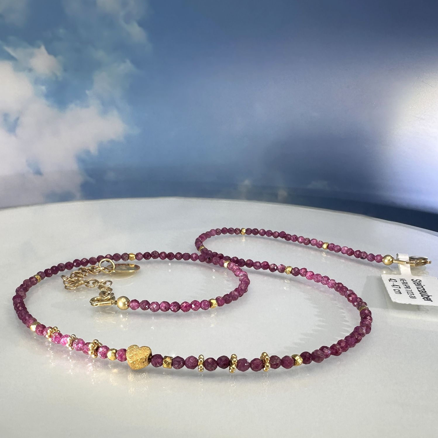 Elegant necklace made of genuine, faceted ruby combined with gold plated 925 sterling silver.