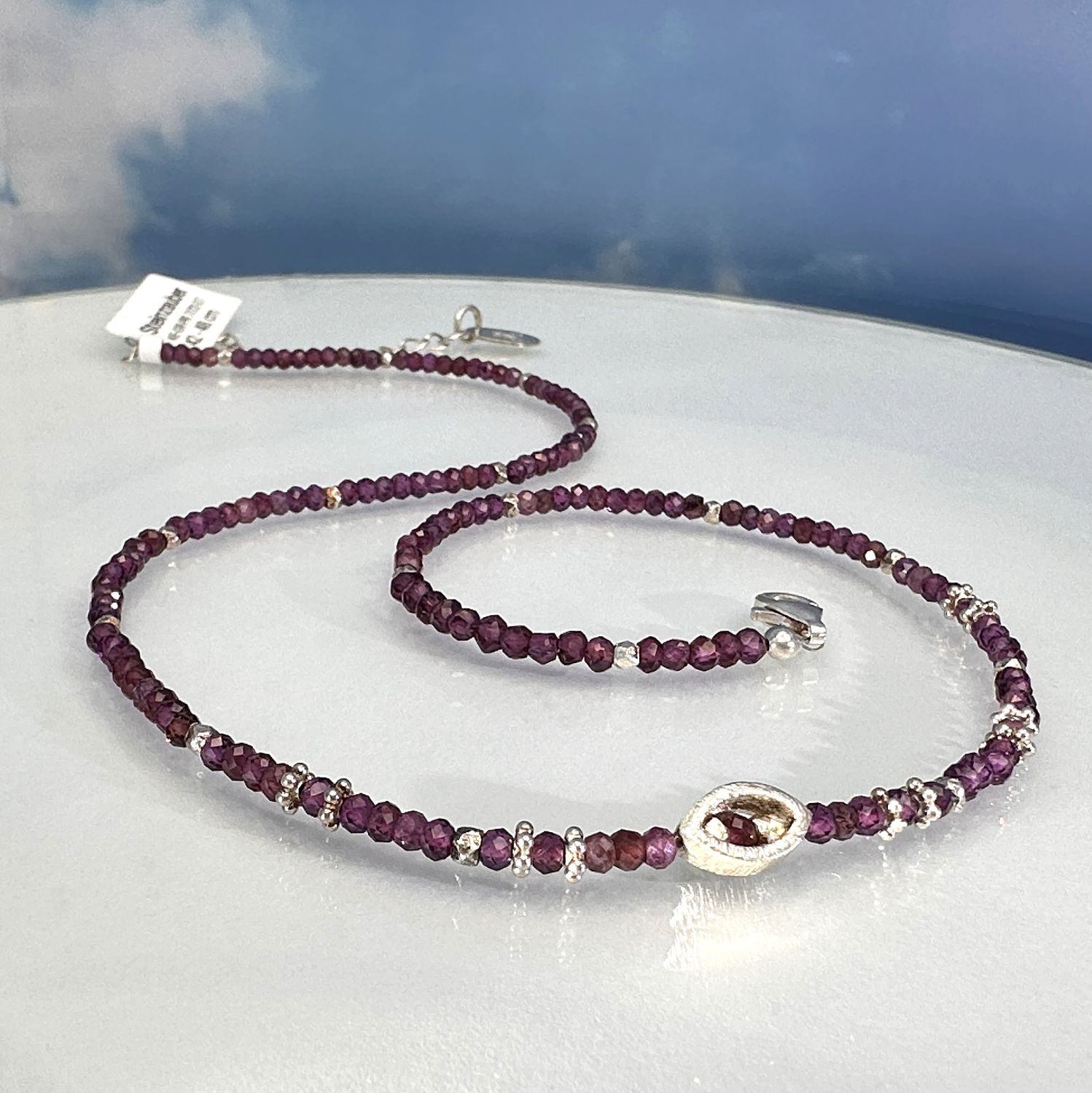 Elegant necklace made of genuine garnet combined with 925 sterling silver.
