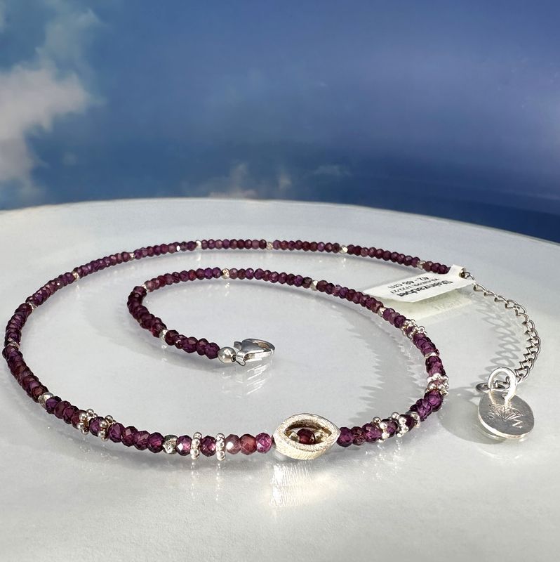 Elegant necklace made of genuine garnet combined with 925 sterling silver.