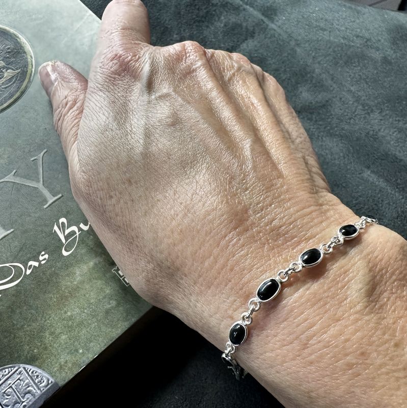 Elegant, delicate bracelet made of 925 sterling silver with real black onyx. 