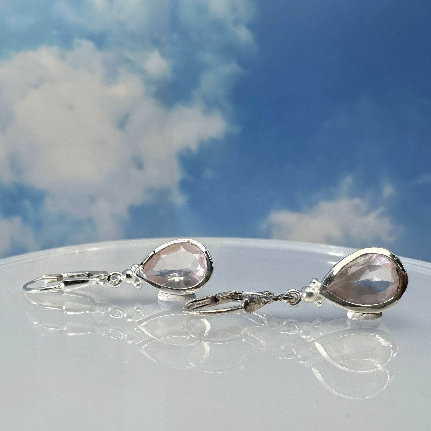 Beautiful earrings made of real, natural rose quartz in 925 sterling silver.