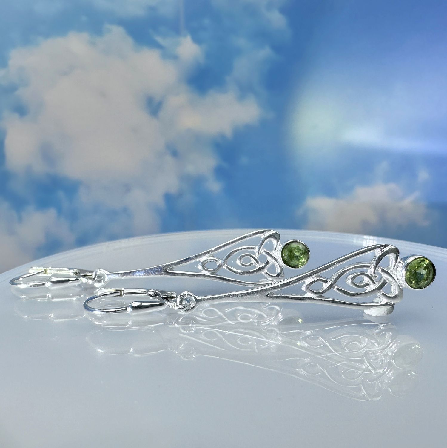 Earrings real peridot 925 sterling silver kletic plattern.