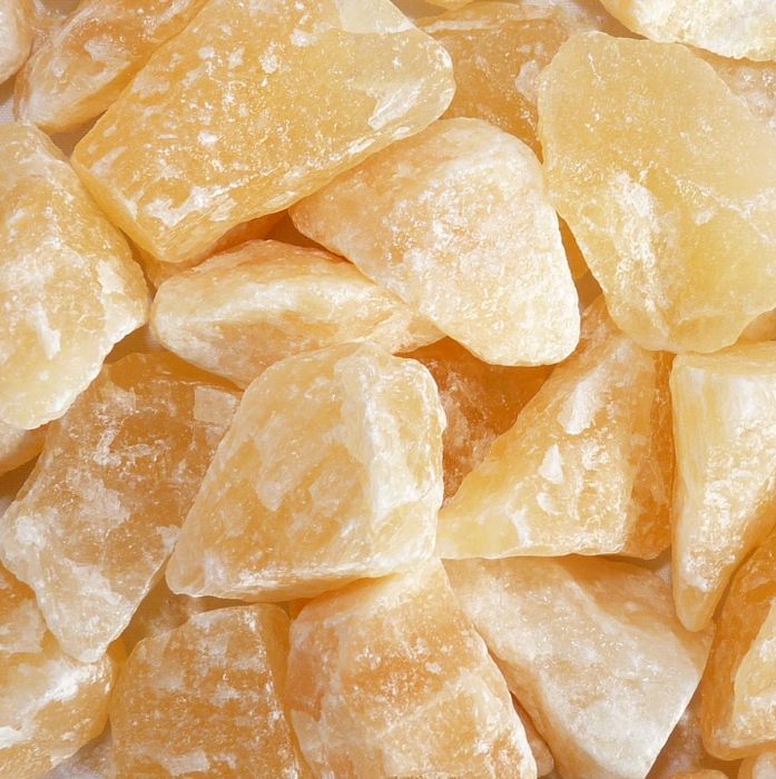Raw orange calcite stone, approx. 2–3 cm