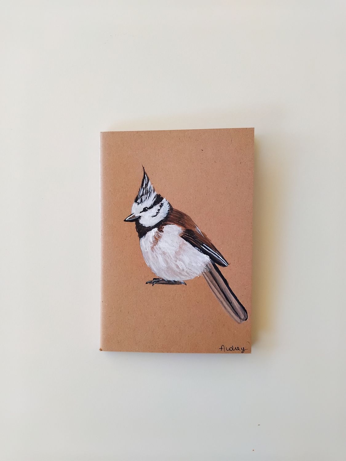 Schrift met kuifmeesje