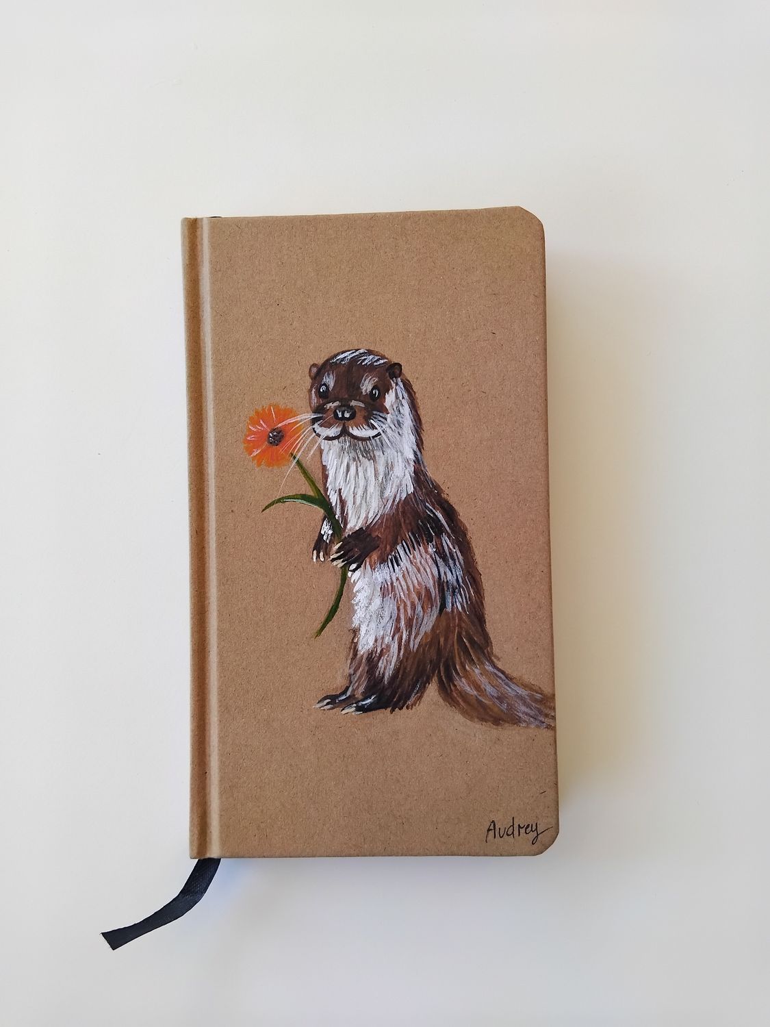 Schrift met ottertje