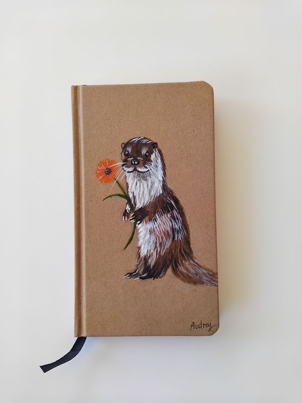 Schrift met ottertje