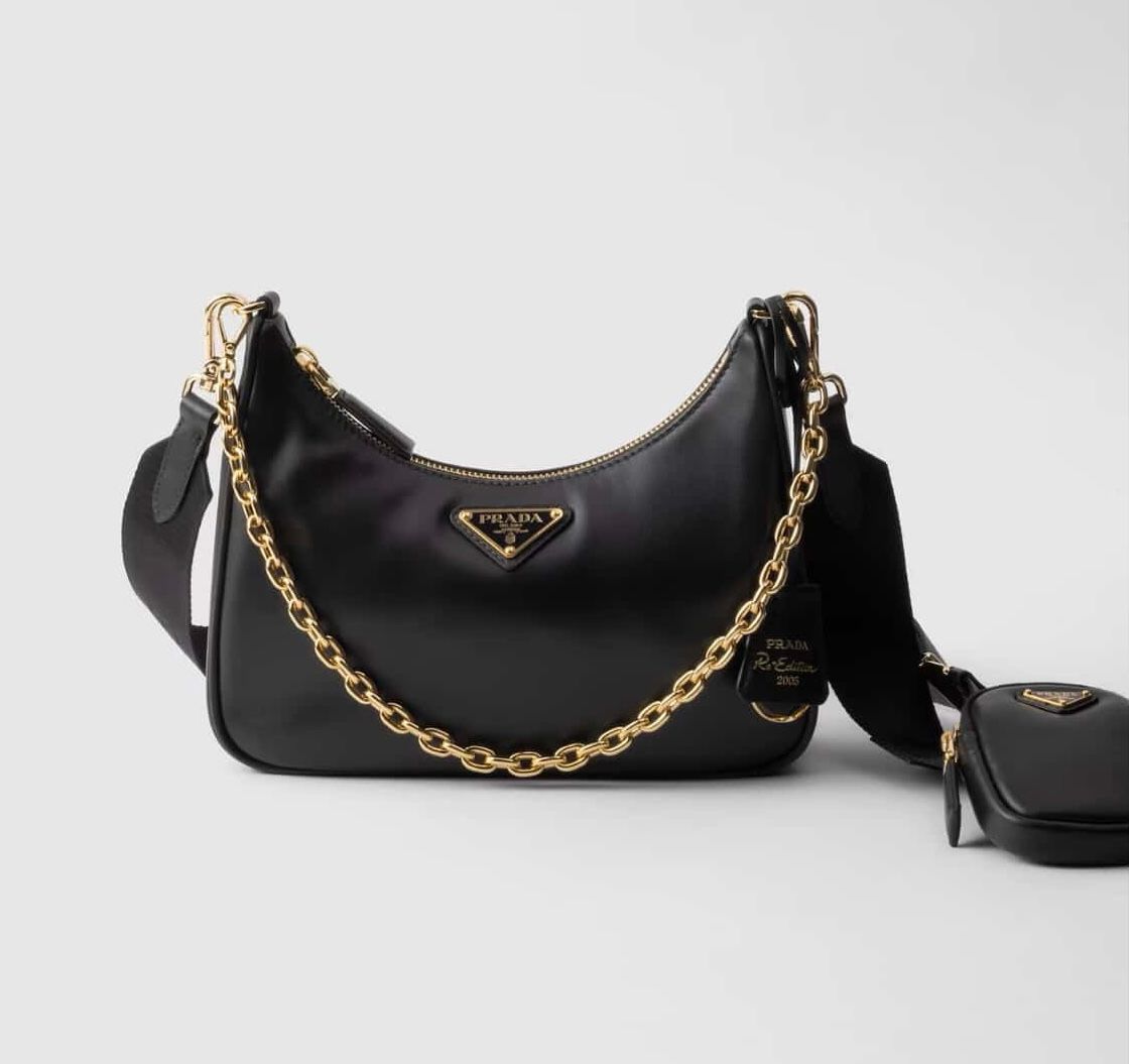 PRADA RE-EDITION 2005 LEATHER BAG IN BLACK AND GOLD