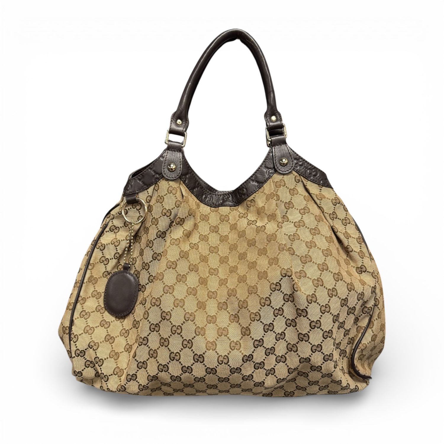 GUCCI BEIGE/EBONY GG CANVAS LARGE SUKEY TOTE BAG W/CHARM