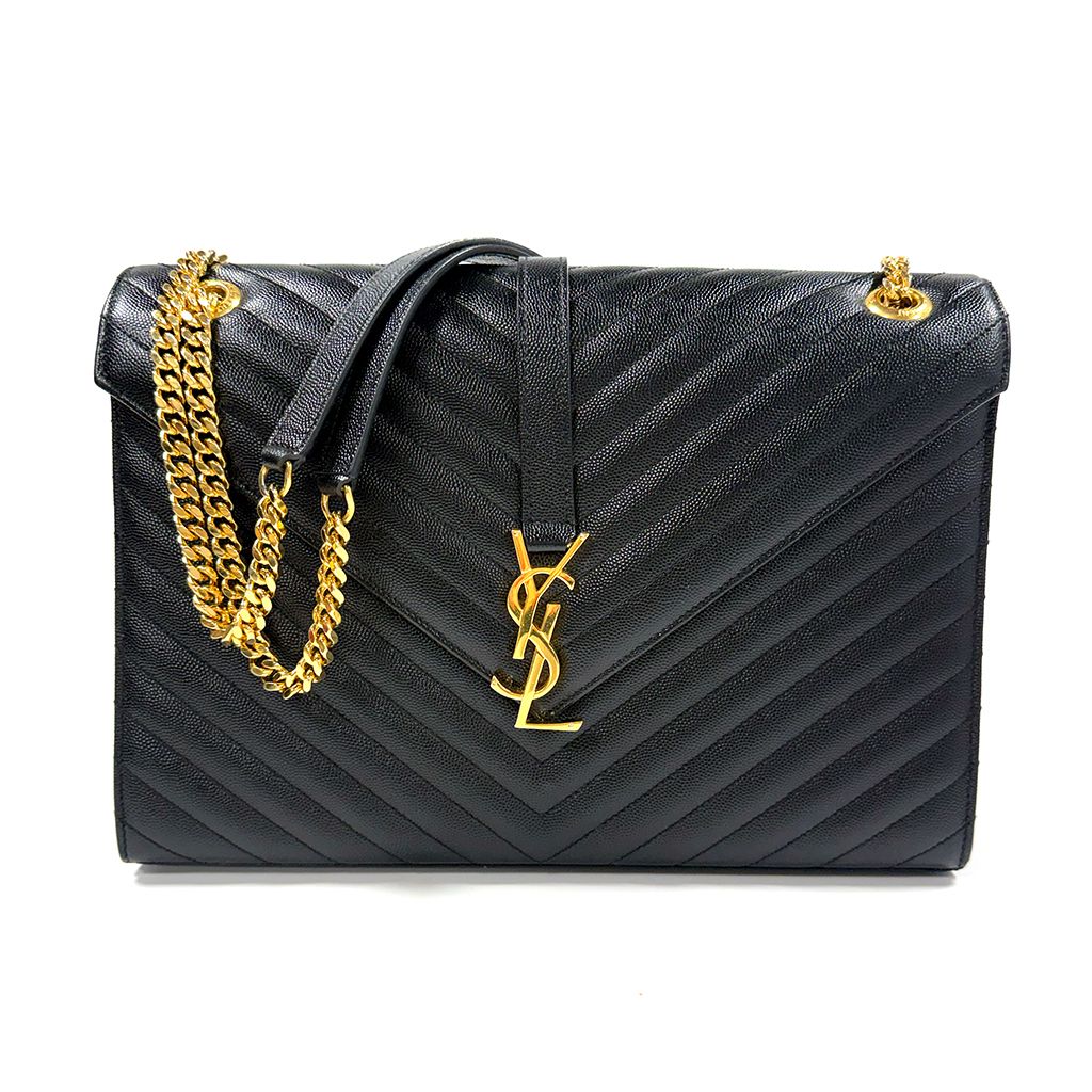 SAINT LAURENT SAC ENVELOPE CASSANDRE GRAND EN CUIR GRAINÉ MATELASSÉ NOIR