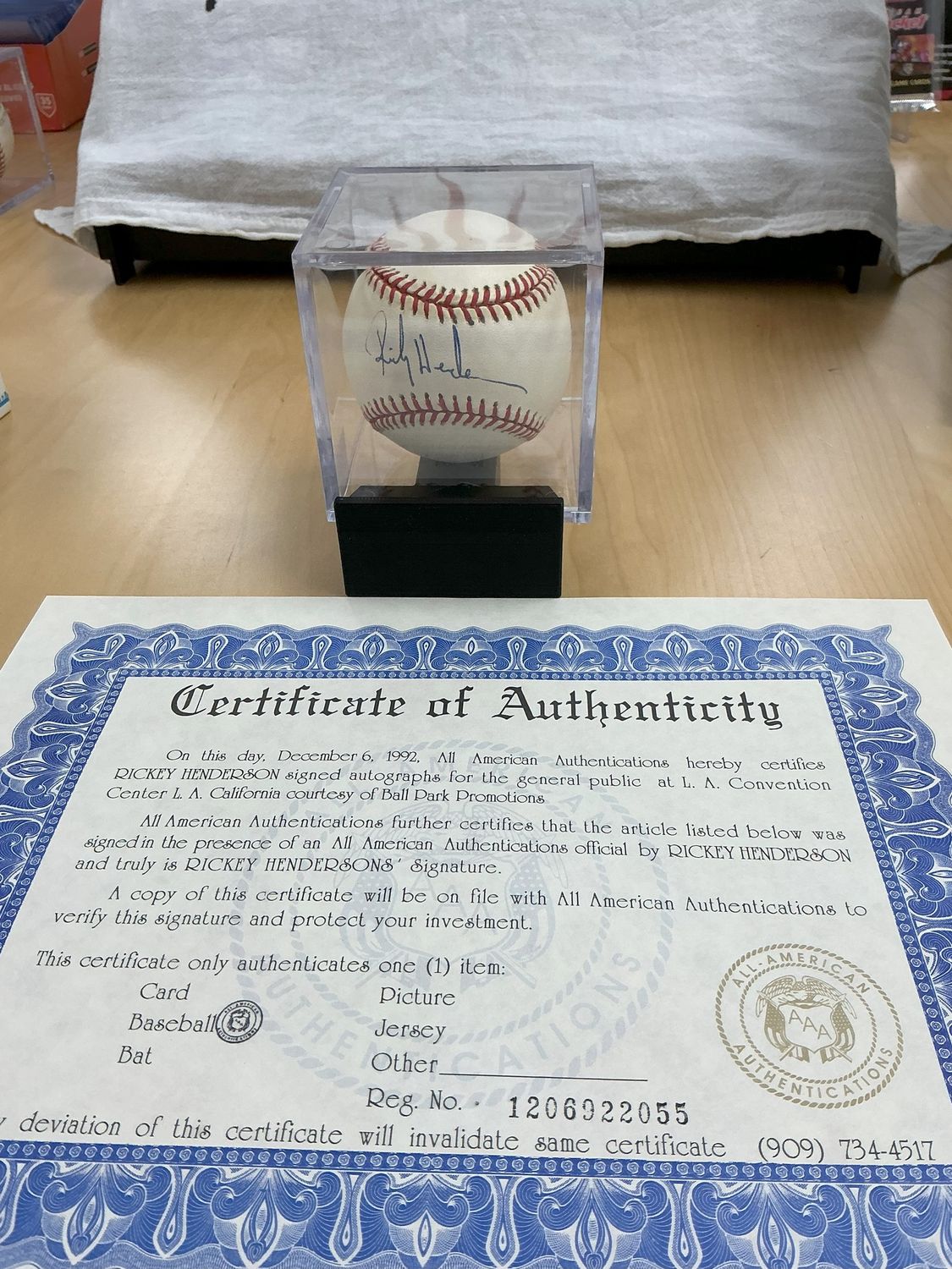 Rickey Henderson Autographed Baseball with All-American Authentication COA