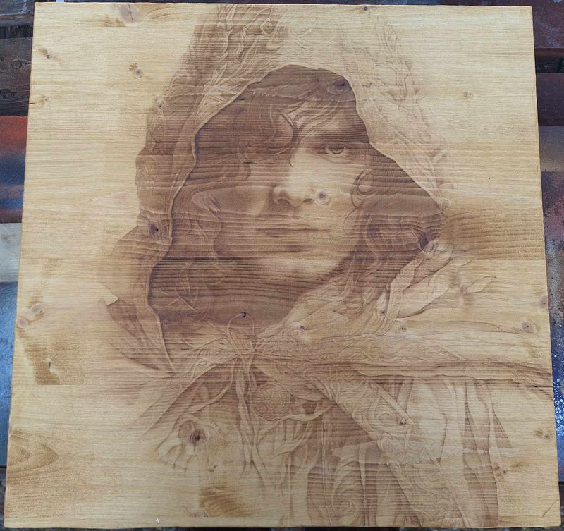 Pyrogravure laser d'un chasseur sur bois