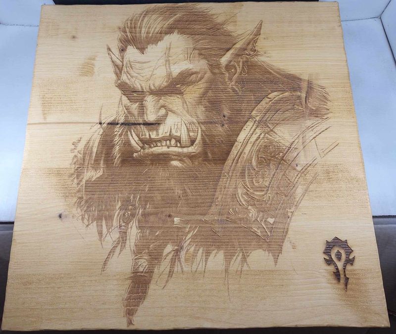 Pyrogravure laser d'un Orc sur bois