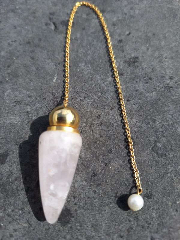 Pendule Quartz rose pierre naturel