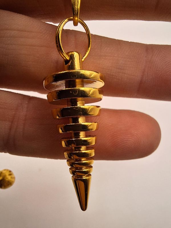Pendule en point laiton dorée