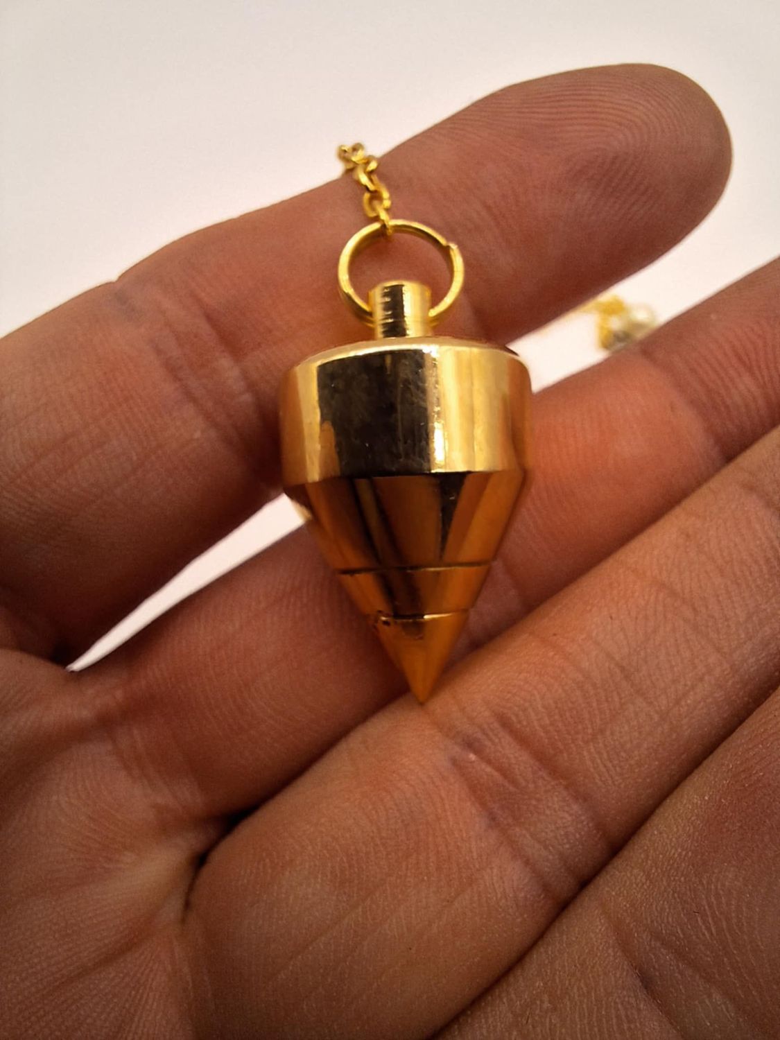 Pendule divinatoire en laiton