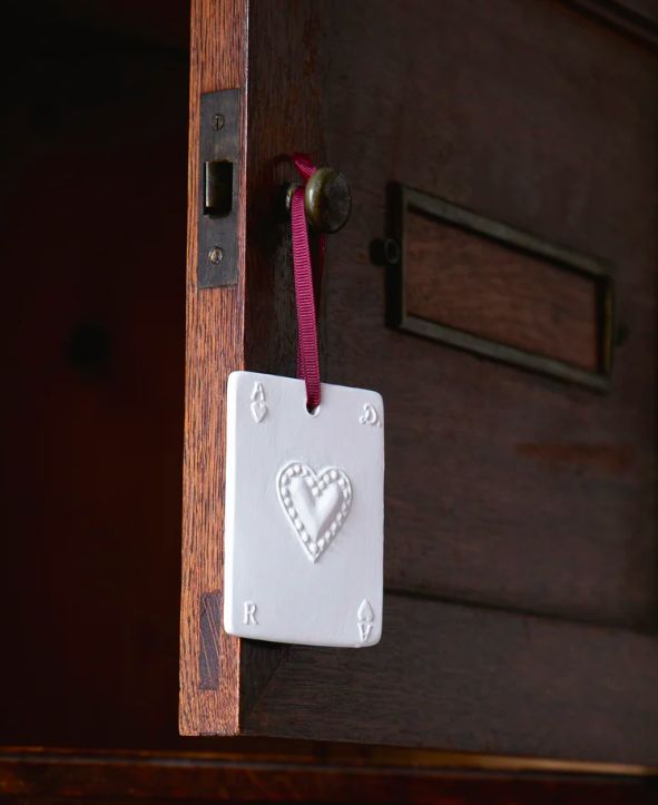 Ace of Hearts scented sculpture and its perfume concentrate