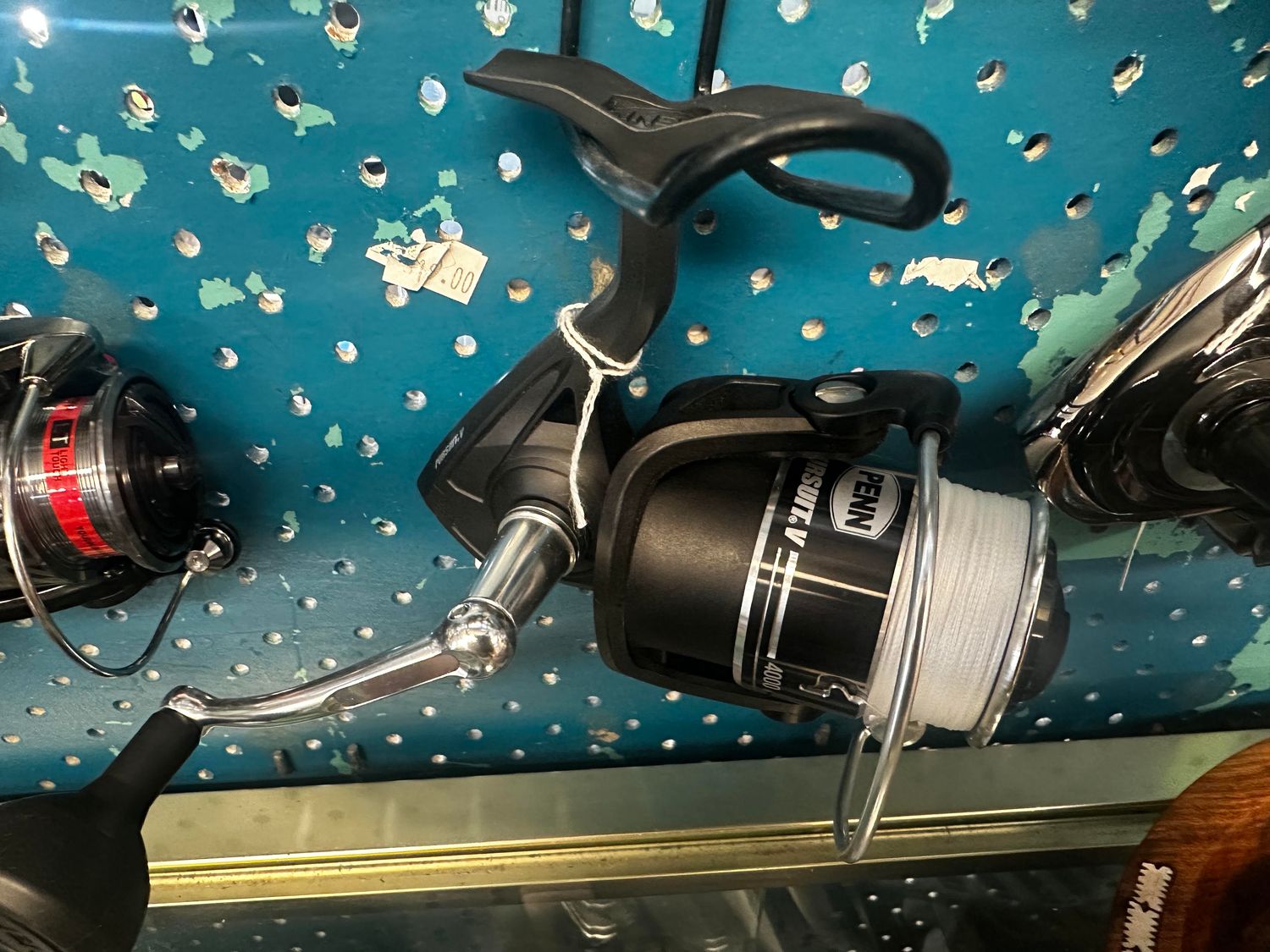 PENN Pursuit V 4000 Spinning Reel w/200mtr 20lb white tasline  braid