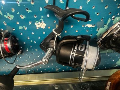 PENN Pursuit V 4000 Spinning Reel w/200mtr 20lb white tasline  braid