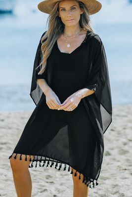 Robe de plage surdimensionnée à capuche et pompons noirs