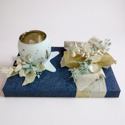 Caja Lindt surtida con Portavela