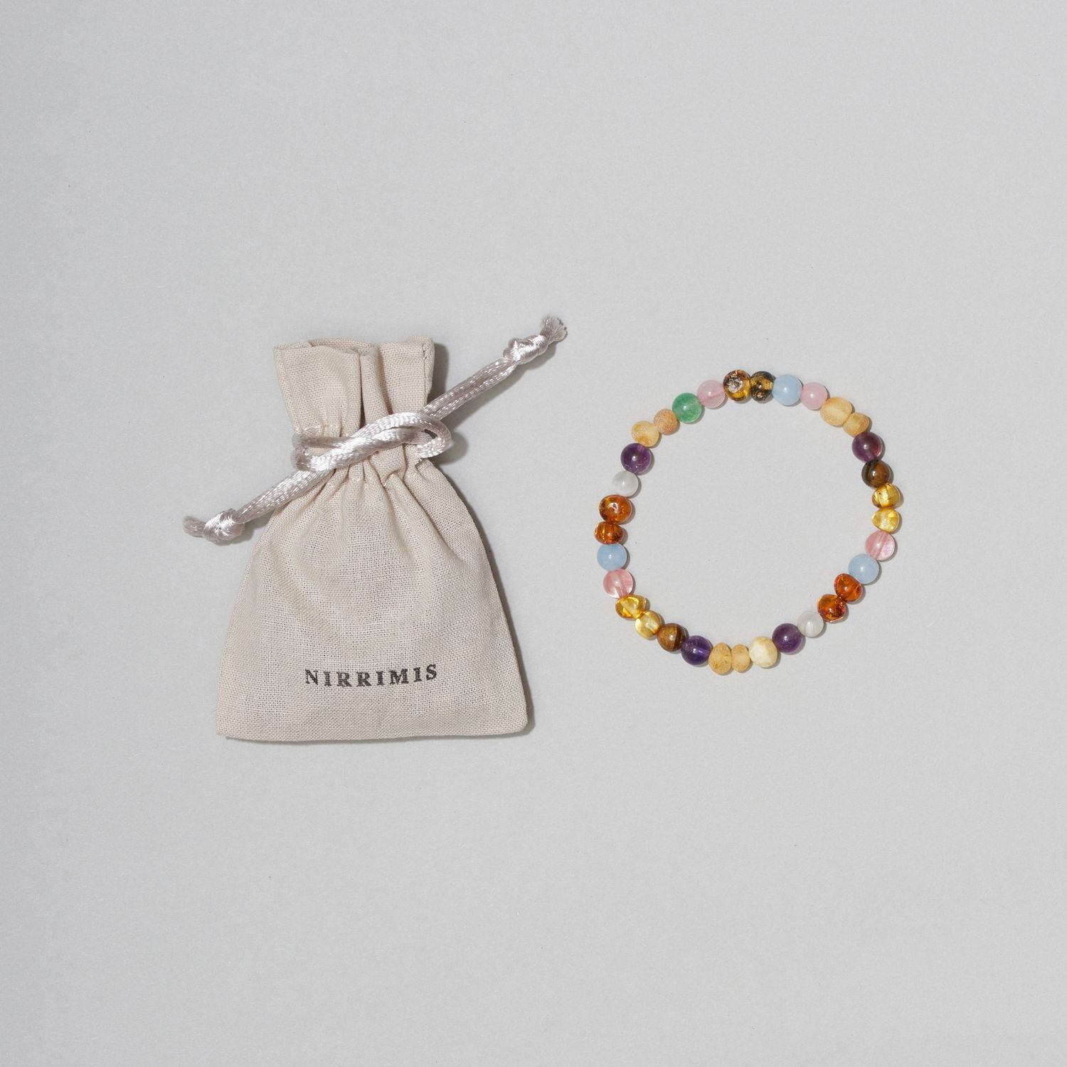 NIRRIMIS - Barnsteen adult Rainbow
