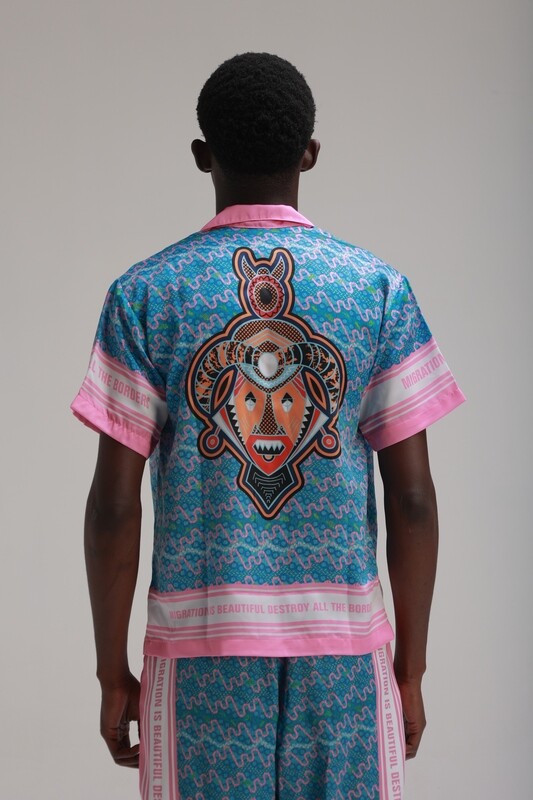 MIGRATION IS BEAUTIFUL SHIRT: PINK AND BLUE