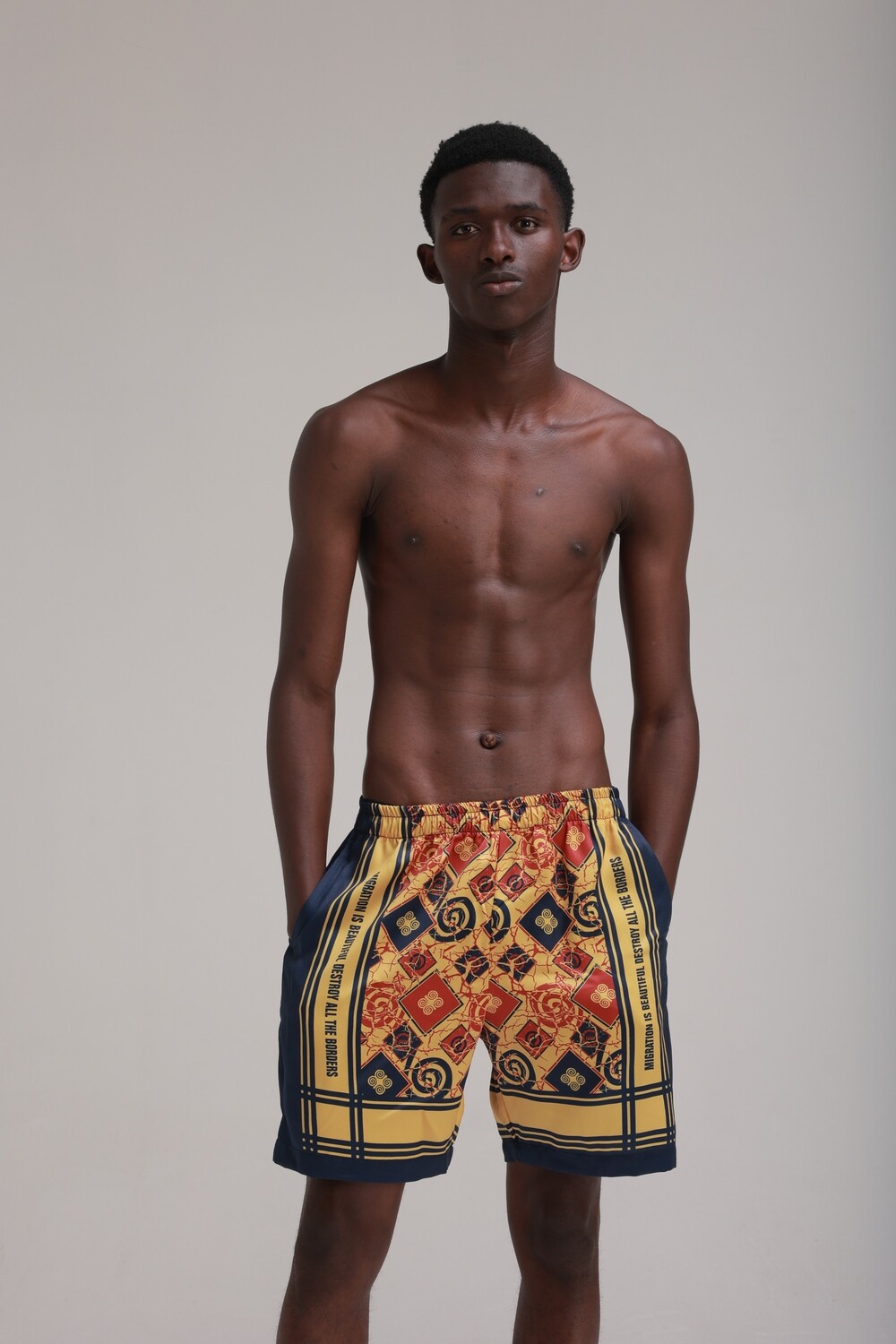 MIGRATION IS BEAUTIFUL SHORTS: YELLOW AND BLUE