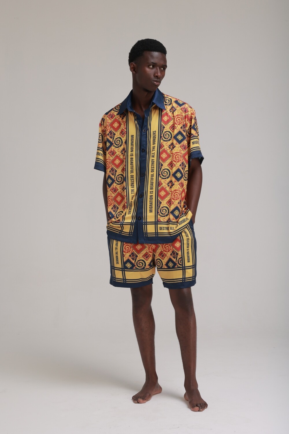 MIGRATION IS BEAUTIFUL SHIRT: YELLOW AND BLUE