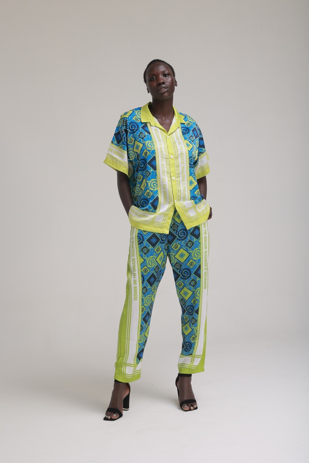 MIGRATION IS BEAUTIFUL PANTS: GREEN AND BLUE