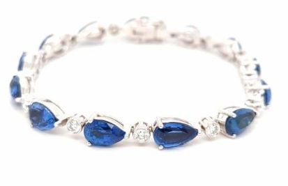 18K White Gold 24.08ctw Pear Shape Sapphire and 1.2ctw Round Diamond Bracelet
